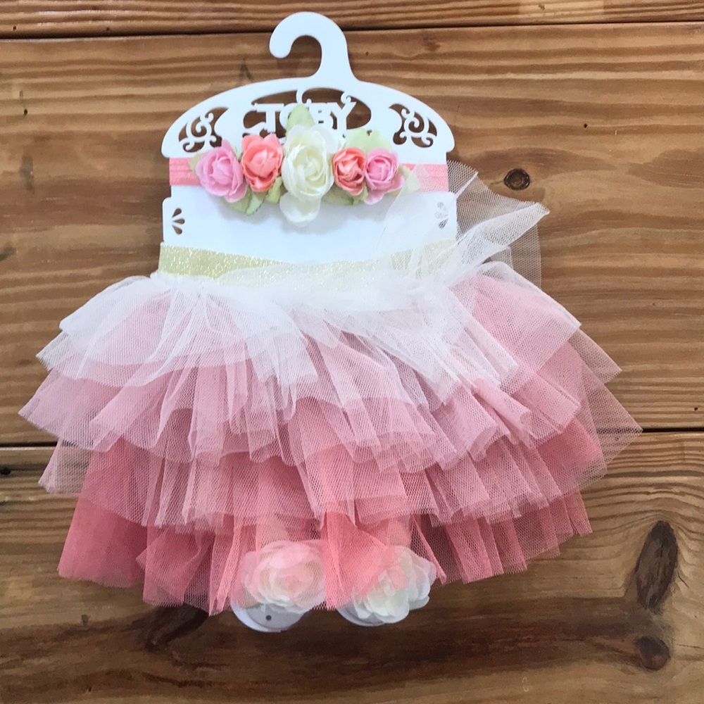 Flower headband, tutu, and flowers for feet.